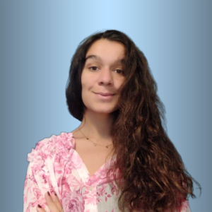 Young woman with curly hair against a blue background